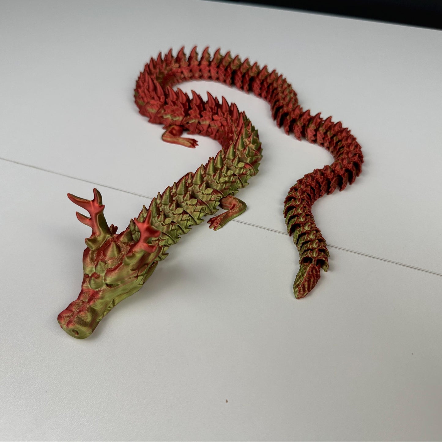 3-D Printed Articulating Dragon with Antlers