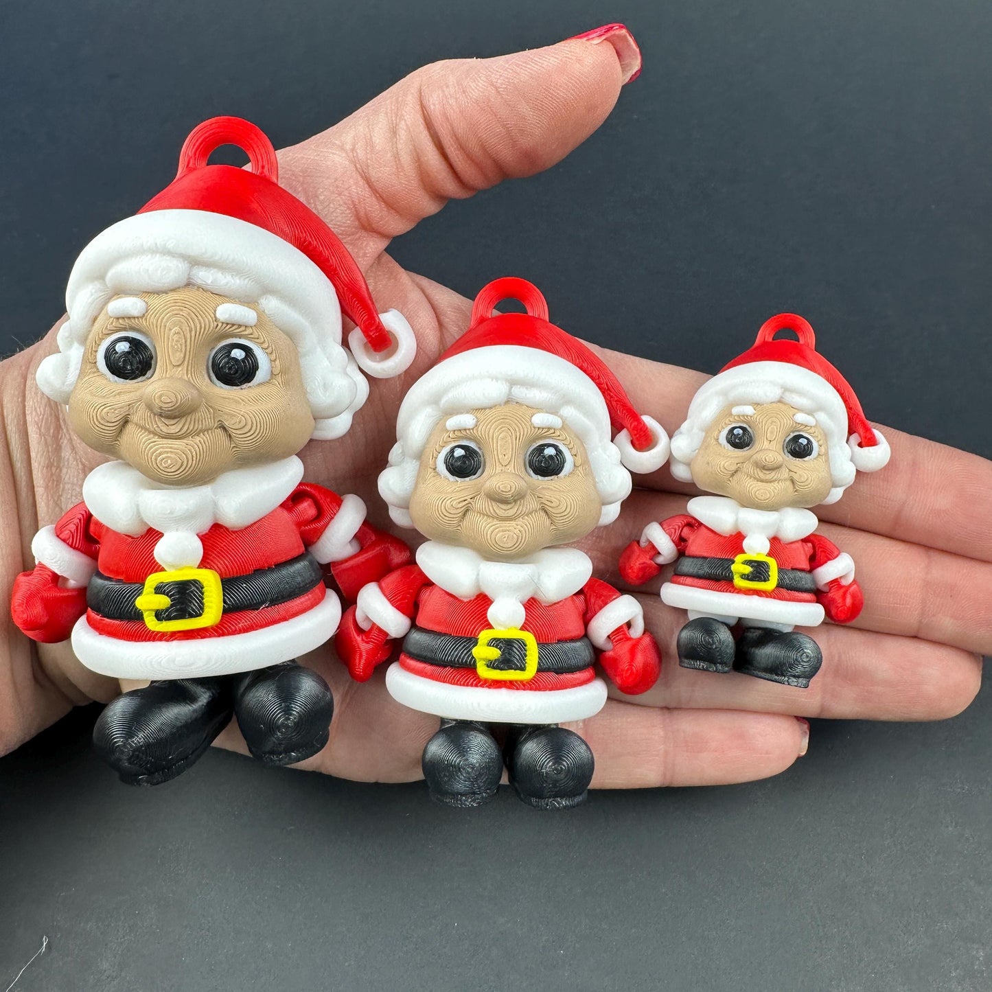 3D Printed Santa Family Articulating Ornaments.