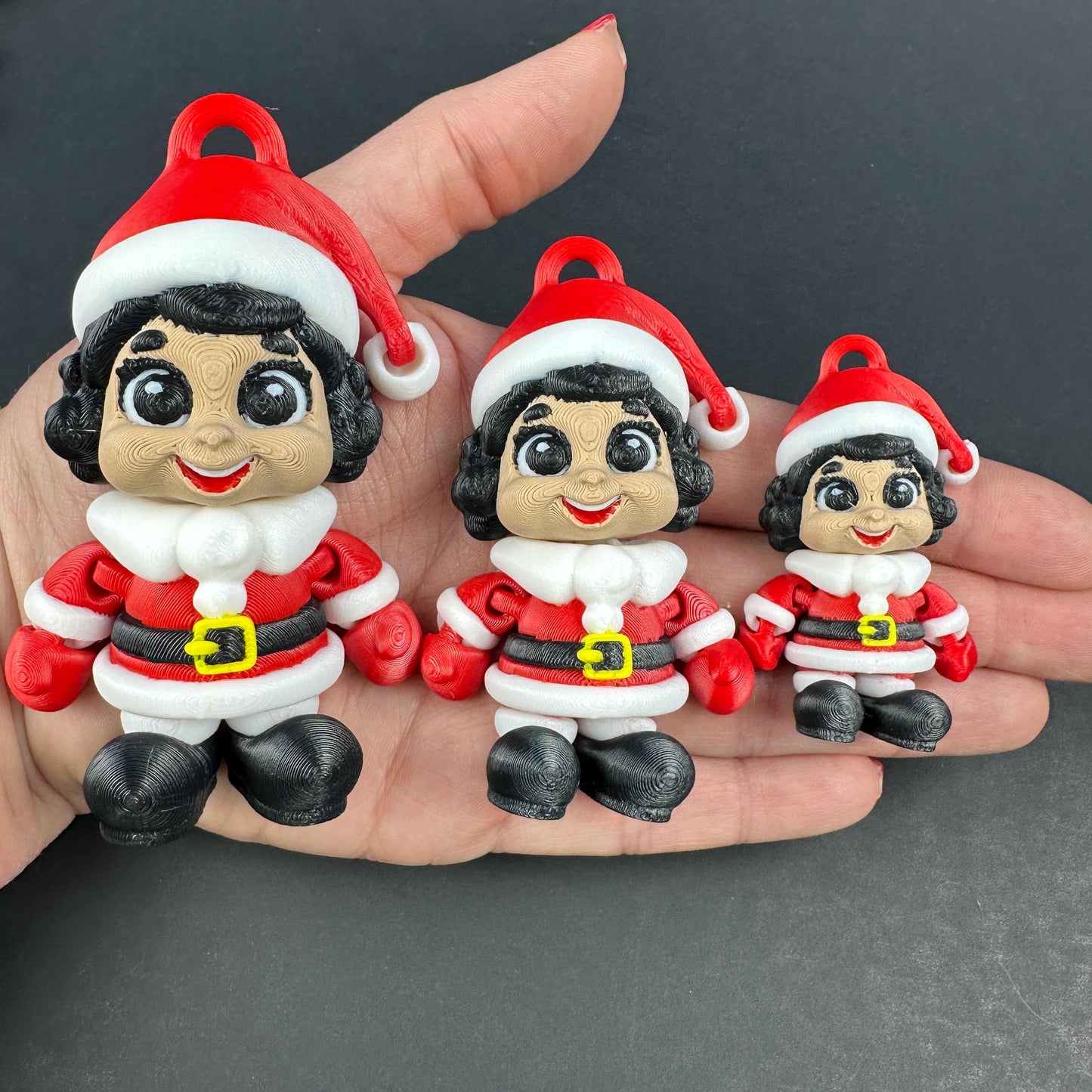 3D Printed Santa Family Articulating Ornaments.